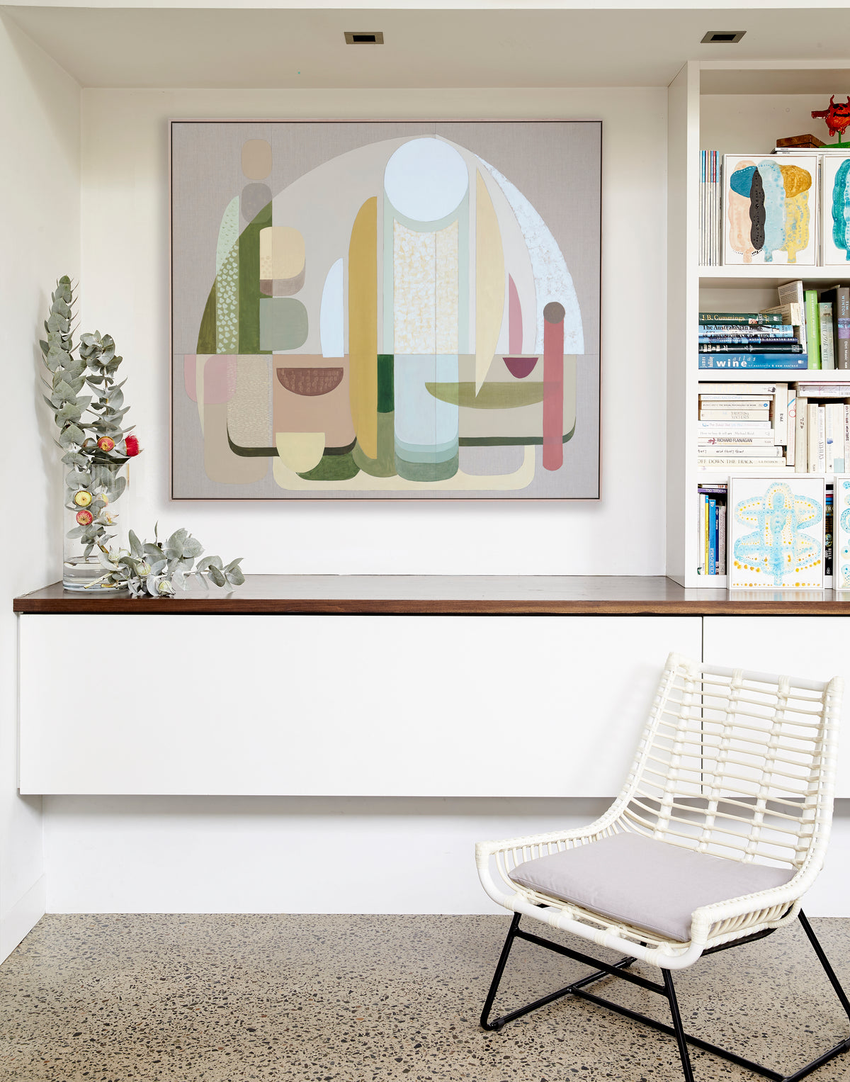 Adonis abstract wall art print large framed, displayed on white shelves alongside Zeus print and decorative ceramics