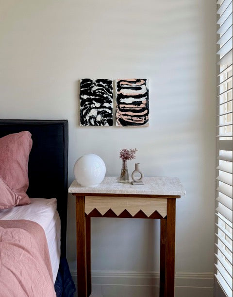 Marble Impasto paintings by Tory Burke hung as a pair in a styled interior