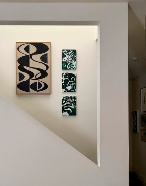 Green Marble Impasto paintings by Tory Burke hung in a styled interior