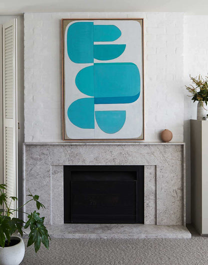 Large aqua abstract wall art above sofa in modern coastal living room