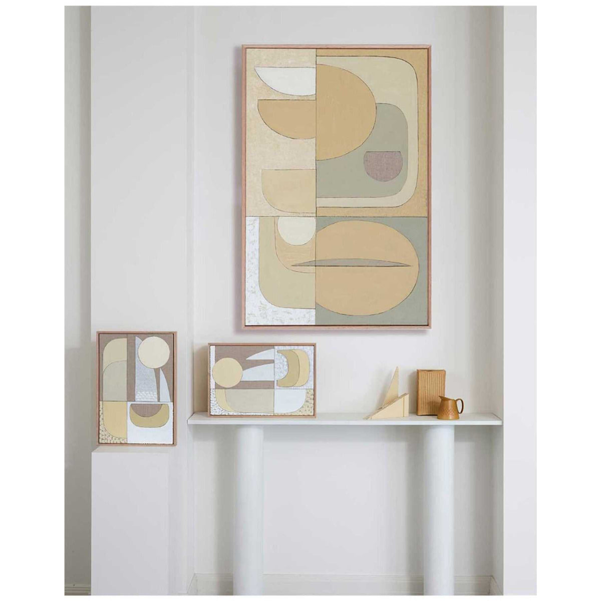Soft neutral abstract wall art above bed in modern bedroom