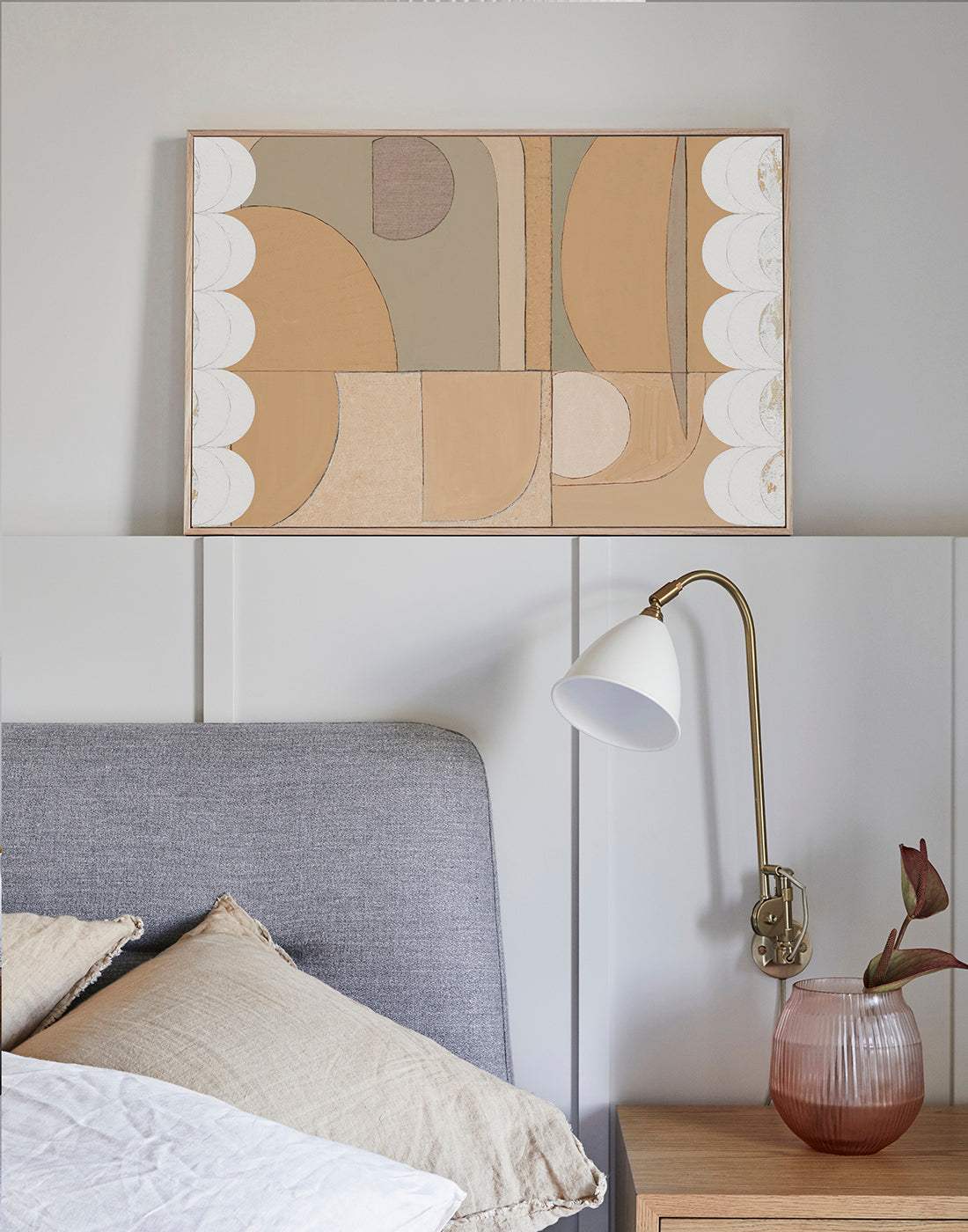Clay Scallop - Giclee print artwork framed in raw oak above a bed on a bedroom wall