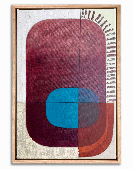 Abstract art piece with geometric shapes in a wooden frame