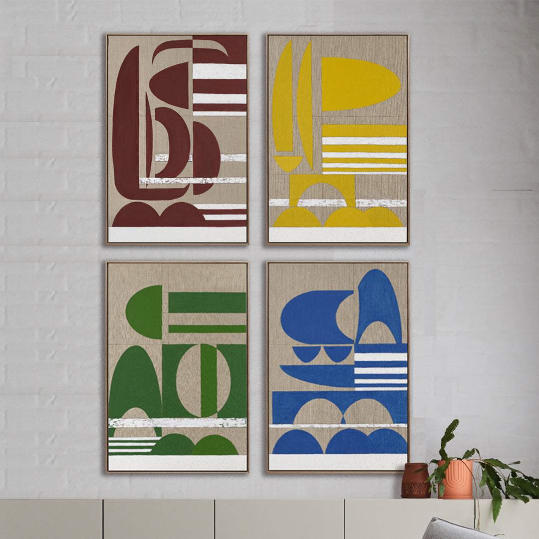 Stucco artwork bundles framed in raw oak on a white wall