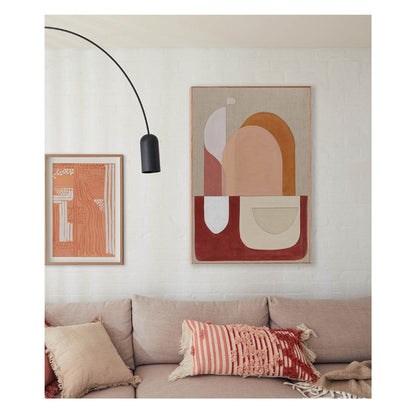 Large red abstract wall art above sofa in modern living room