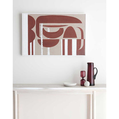 A modern artwork with thick white impasto paint and rich crimson geometric designs, titled 'Stucco', displayed on a wall above a wooden console table with a red vase and a white dish.