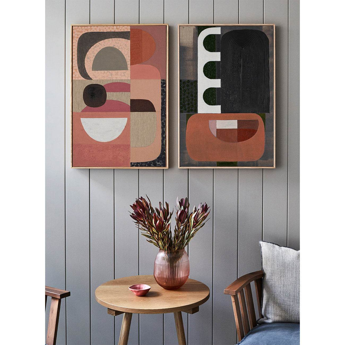 Pink Stucco - Giclee print artwork framed in raw oak on a wall in a lounge setting with another artwork