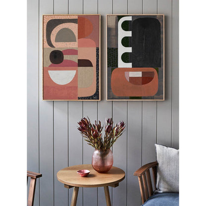Pink Stucco - Giclee print artwork framed in raw oak on a wall in a lounge setting with another artwork